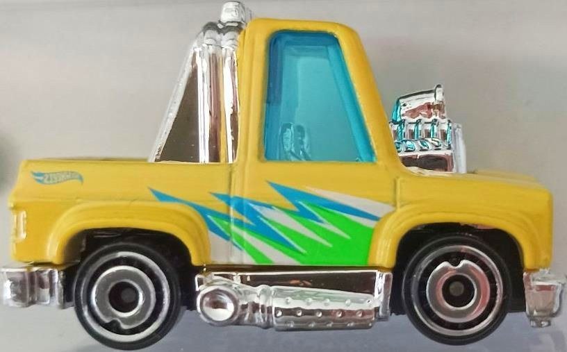 Hot Wheels JBJ85 Toon'd '83 Chevy Silverado 2025 Yellow – photo de la communauté